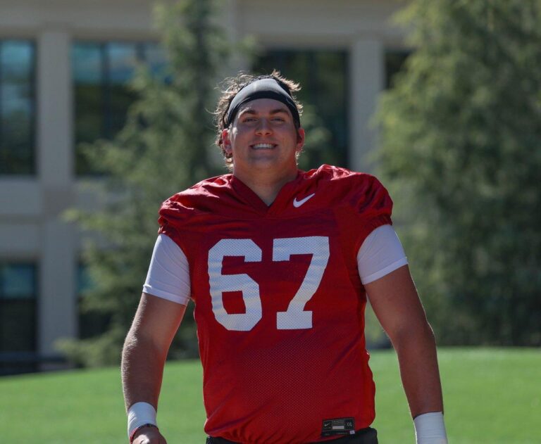 Fisher Plays Football